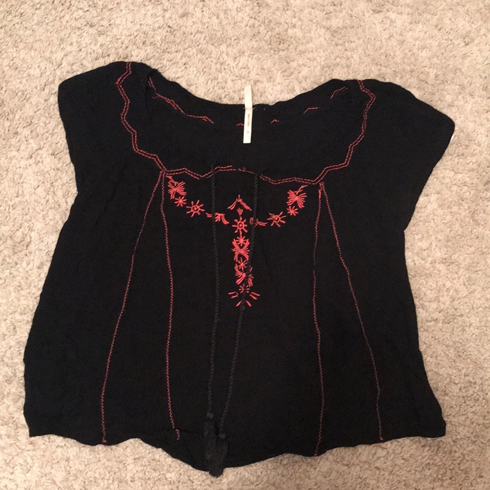 black top with pink detailing